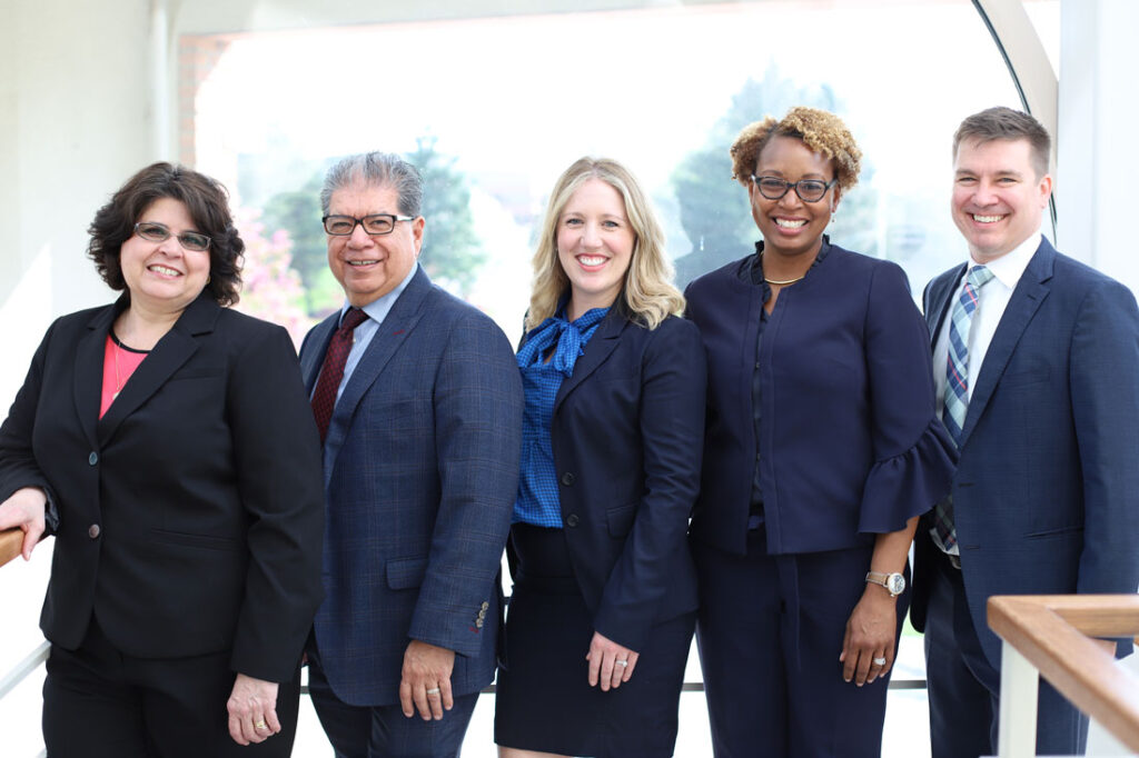 Perez Morris Diversity in Business Award, photo of team in front of a window