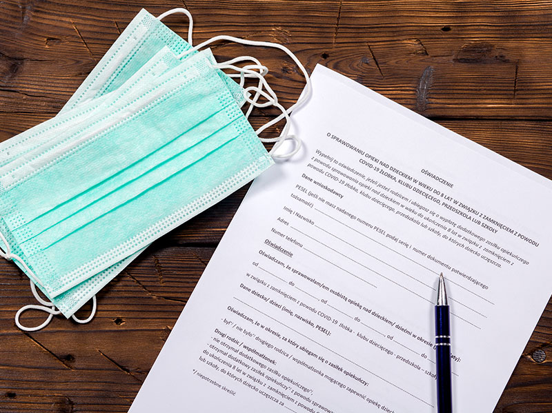 Pile of masks with paperwork