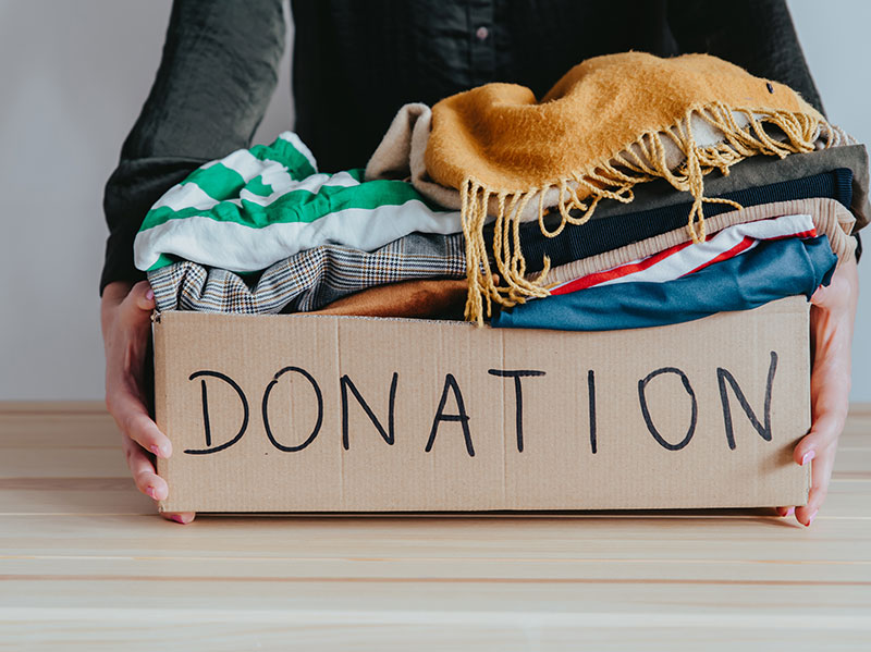 Donation box with clothing