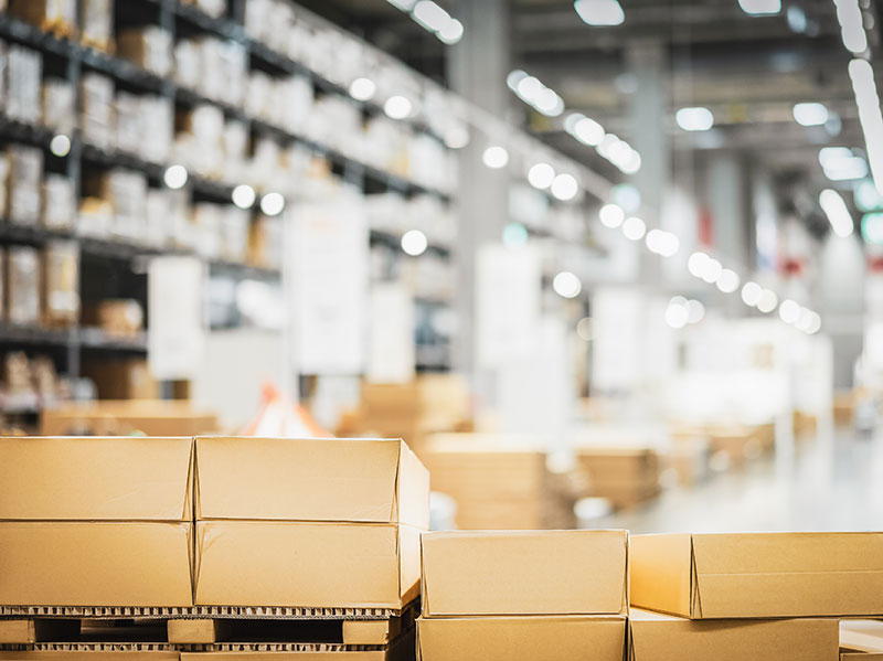 Blurred out photo of boxes in a shipping warehouse